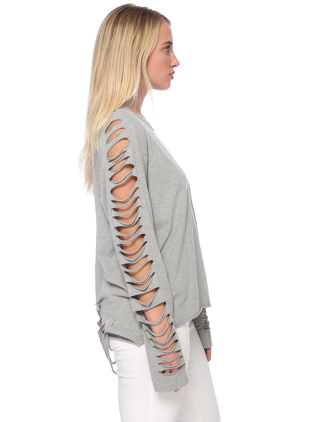 Light gray long-sleeve top with slashed cutouts along the sleeve
