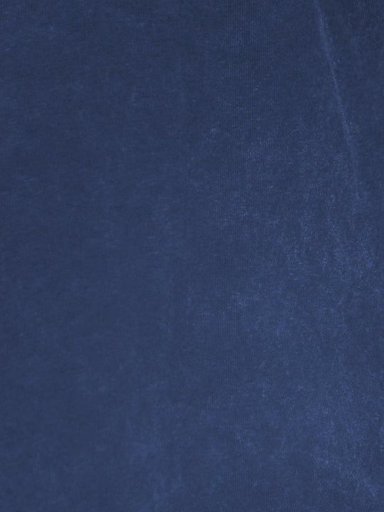 Close-up of navy blue fabric texture for ripped long-sleeve pullover top