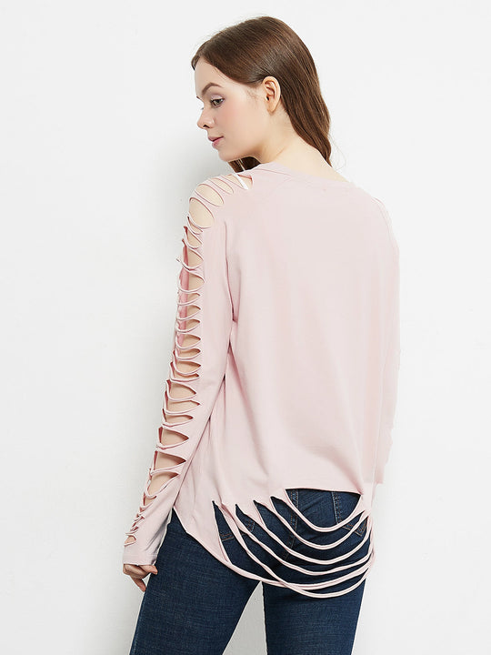 Light pink pullover top, side view with lace-up sleeve cutouts and crew neckline