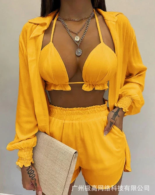 Yellow lantern-sleeve shirt over matching shorts set with ruffled trim and pocket-style shorts