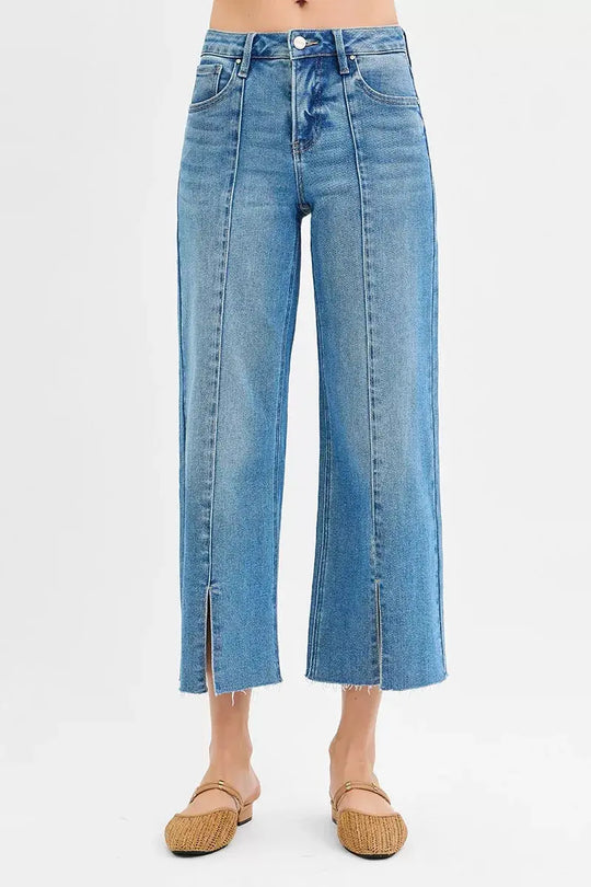 Medium-wash wide-leg crop jeans, mid rise, with front slits at the hem