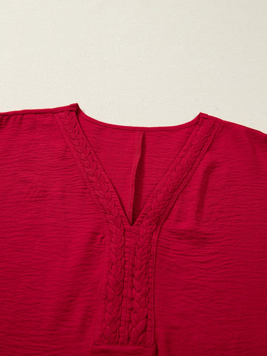 Deep Red V-neck blouse detail with braided embroidery along center placket