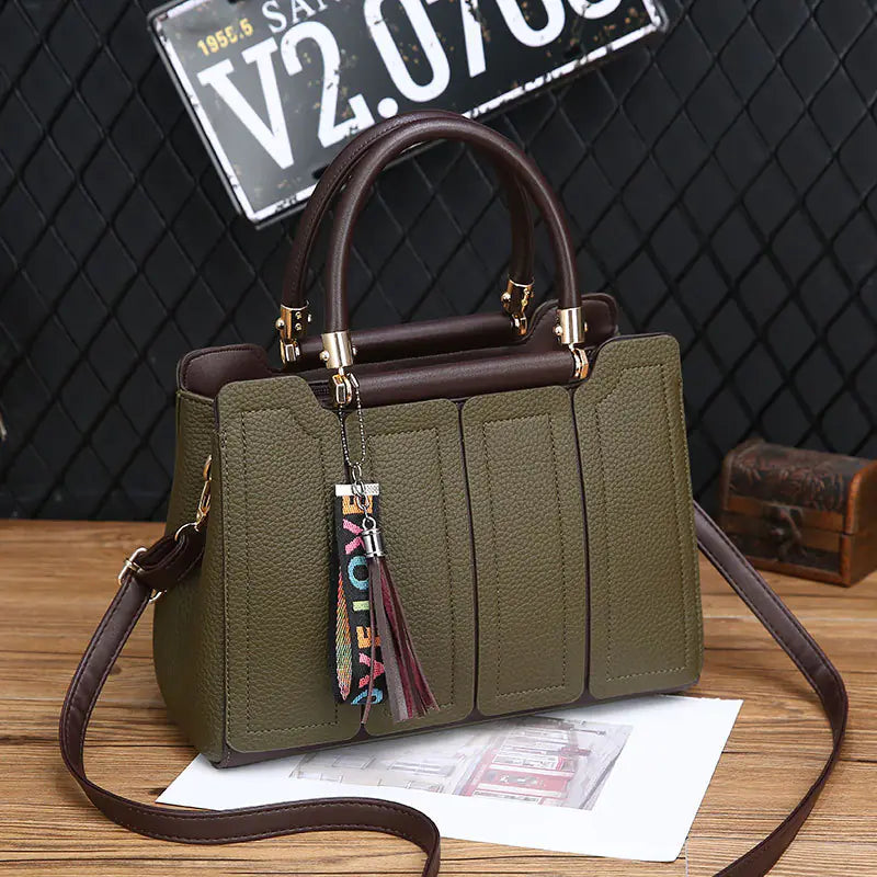 Shoulder tote bag in olive green with tassel keychain, dual top handles