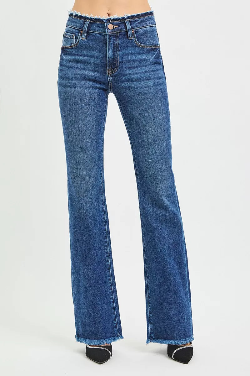 Dark blue mid-rise bootcut jeans with frayed waistband hem detail