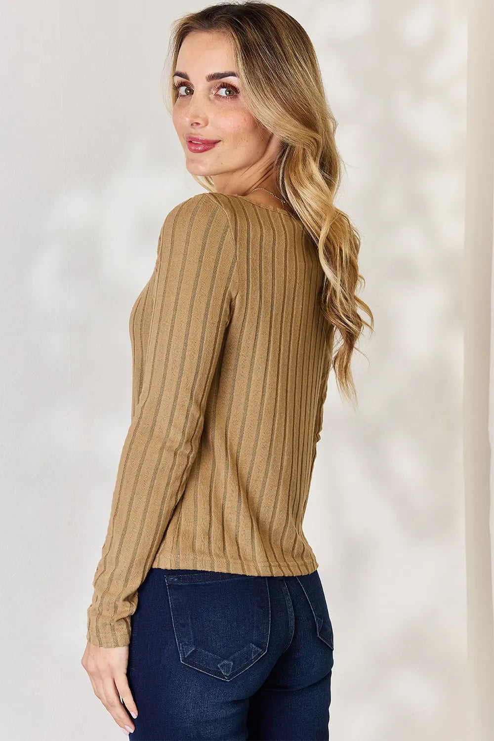 Khaki ribbed long-sleeve T-shirt, side view with stretchy knit texture
