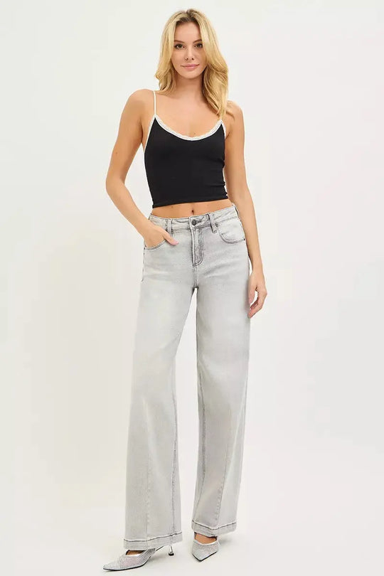 Light gray baggy jeans with contrast stitching, wide leg and button fly