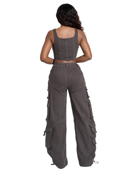 Low-rise twill cargo pants back view, dark charcoal with cargo pockets and drawcord hem