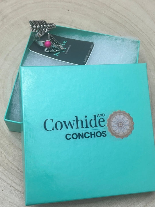 Cowhide and Conchos jewelry box with metal conchos logo