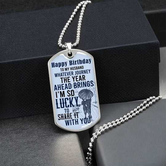 Happy Birthday dog tag necklace on a silver chain, engraved message on the front