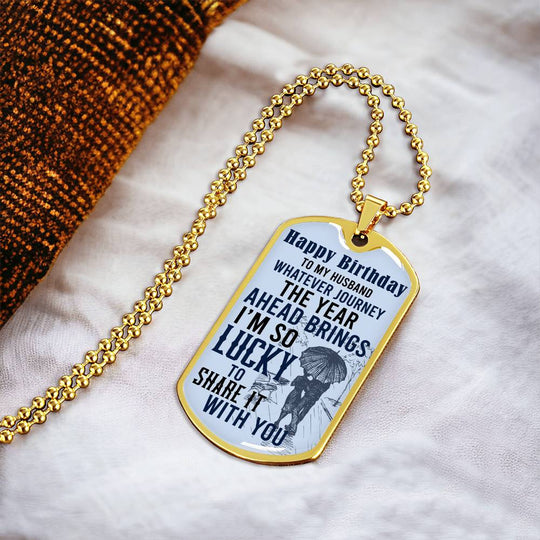 Happy Birthday dog tag necklace on a gold chain with “Happy Birthday” front