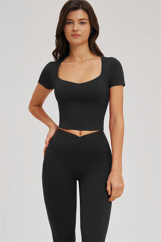 Black T-shirt and leggings 2-piece set, scoop neckline crop top and high-rise leggings