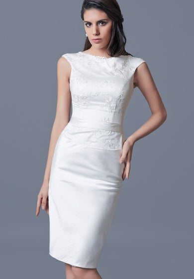 White satin knee-length sheath dress with bateau neckline and lace detail