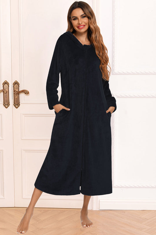 Black zip-front hooded night dress with pockets, long sleeves, midi length