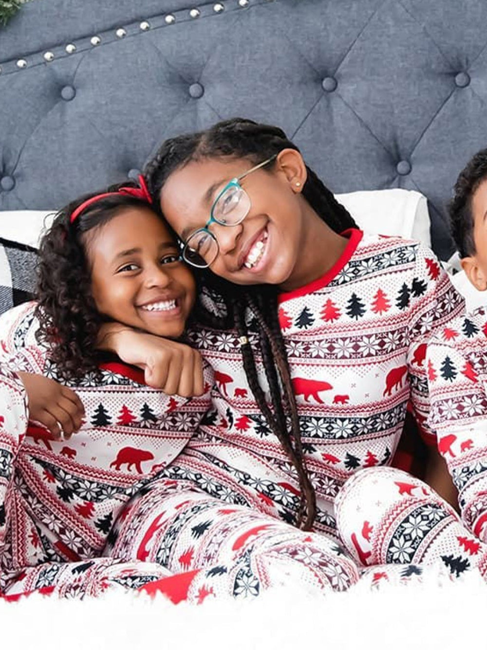 Kids Christmas pajama set with long sleeves, red/white/black holiday animal and tree print