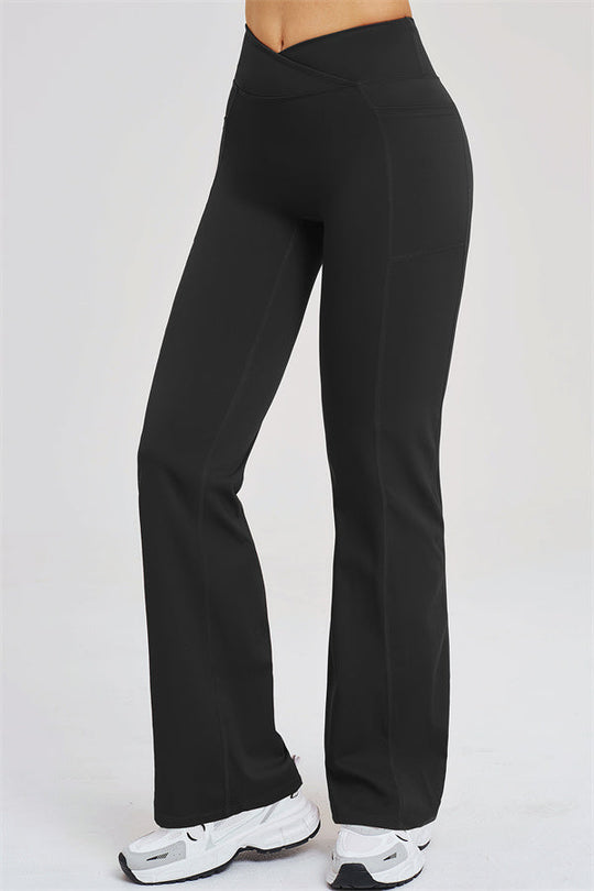 Black high-rise flared leggings, side view