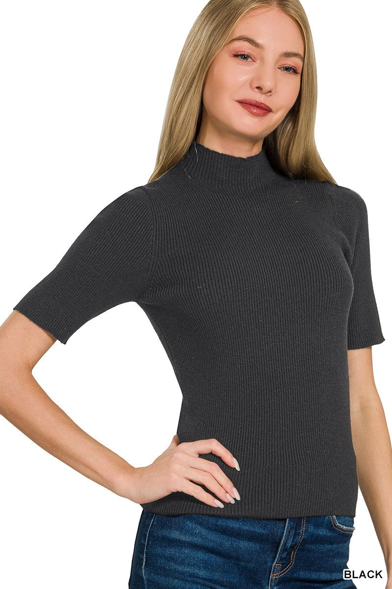Black ribbed mock neck top with short sleeves, close neckline and fit