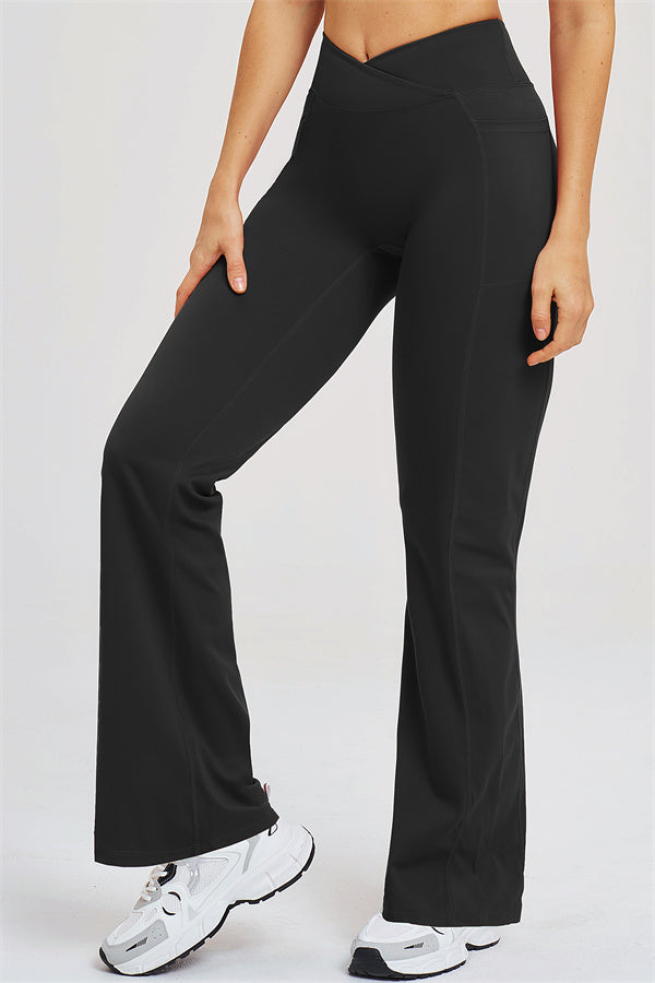 Black flared leggings, full length with wide-leg flare