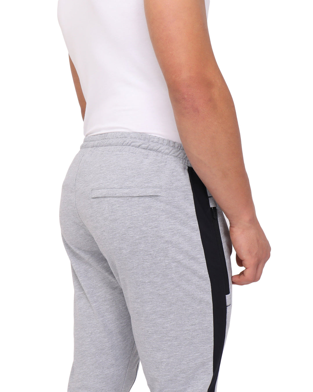 Light grey heather jogger pants with side stripe, back pocket tab, and tapered fit