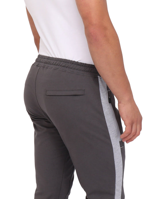 Infinite Flex Jogger TALL close-up: dark grey fabric with light grey vertical stripe and pocket