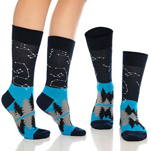 Blue crew socks with starry constellation lines and pine-tree silhouettes, dark tops
