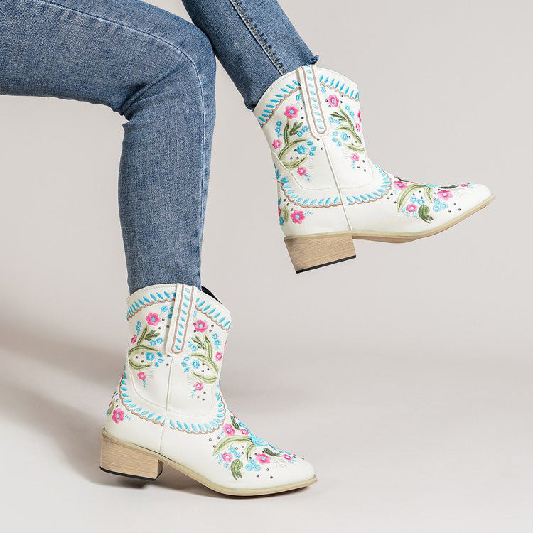 White western mid-calf boots with floral embroidery, blue stitched accents, stacked block heel