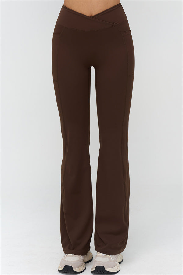 Leggings acampanados marrón, vista trasera con panel central y dobladillo ancho