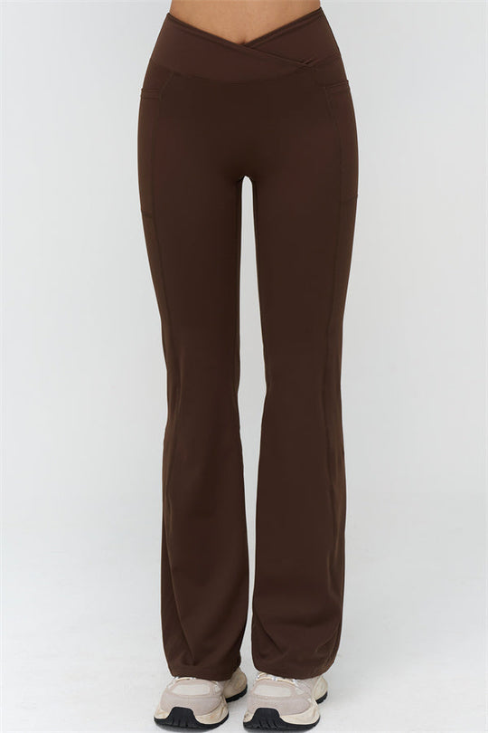 Leggings acampanados marrón, vista trasera con panel central y dobladillo ancho