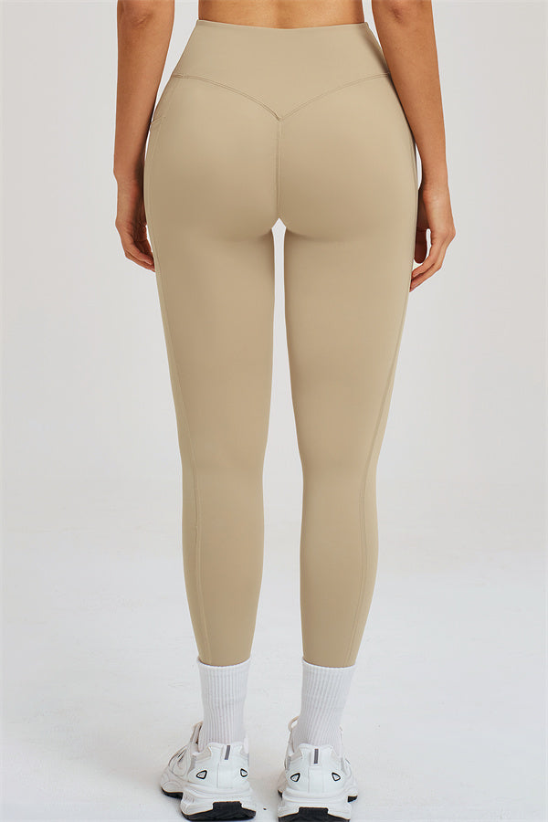 Almond high-rise leggings front view with smooth contour seams