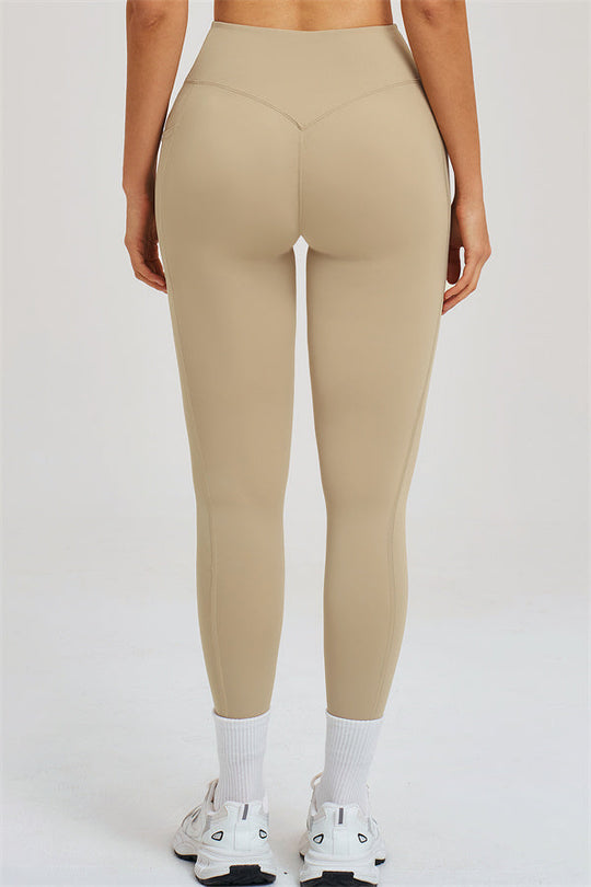 Almond high-rise leggings front view with smooth contour seams