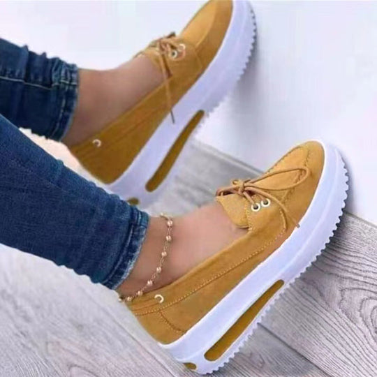 Yellow platform heel loafer sneakers, lace-up front, chunky white sole
