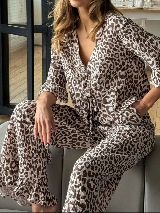 Leopard-print lounge set: ruffle-trim V-neck top and matching wide-leg pants