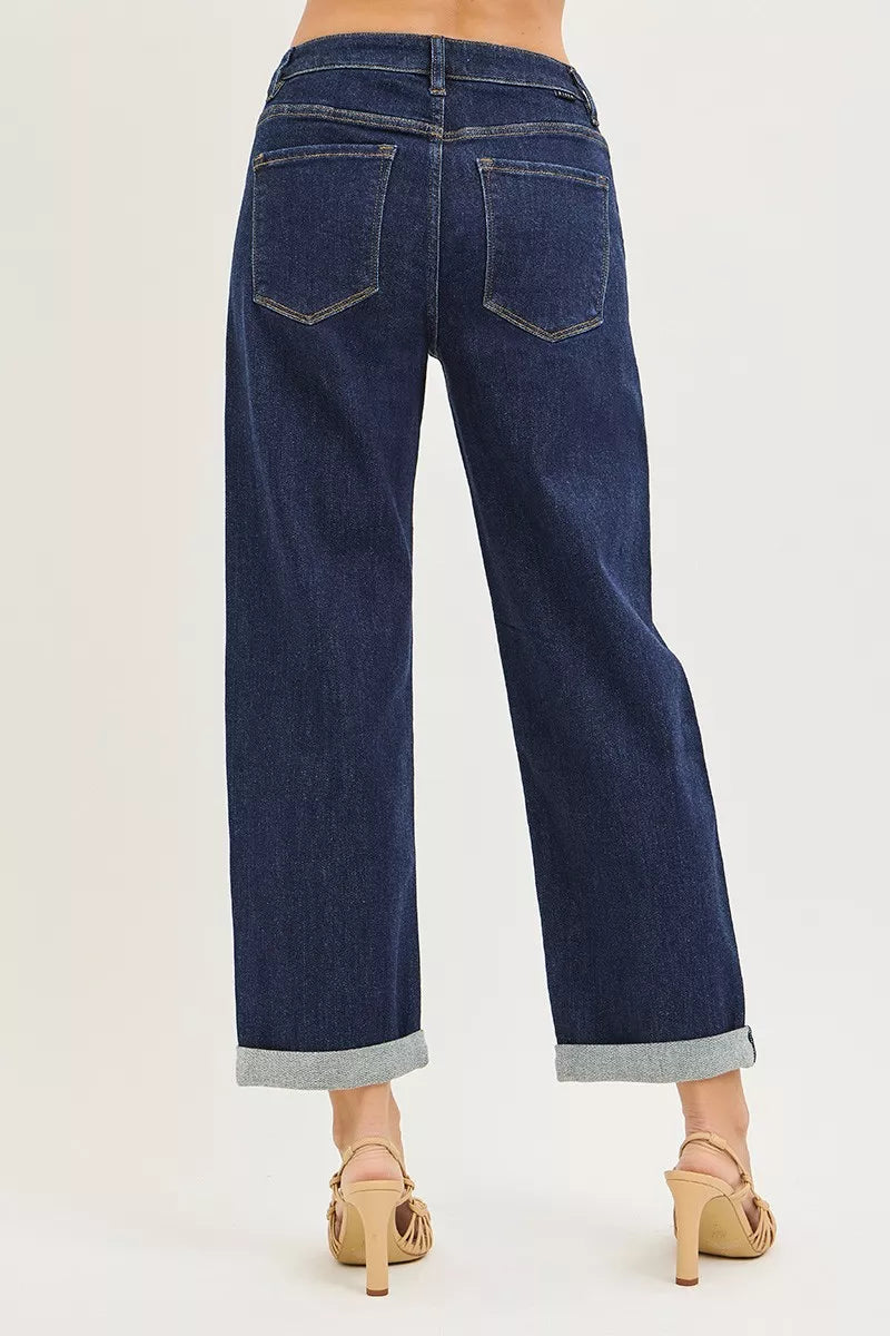 Dark blue boyfriend jeans back view with two patch pockets and cuffed hem