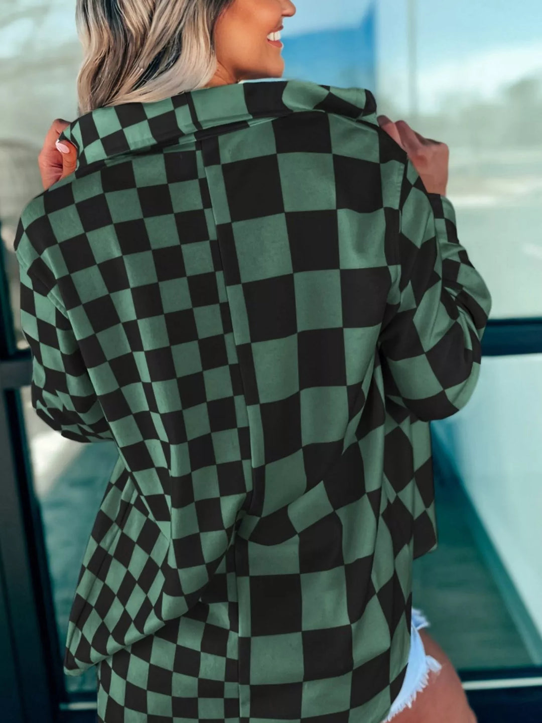 Dark green checkered oversized button-up jacket, back view with wide collar and sleeves