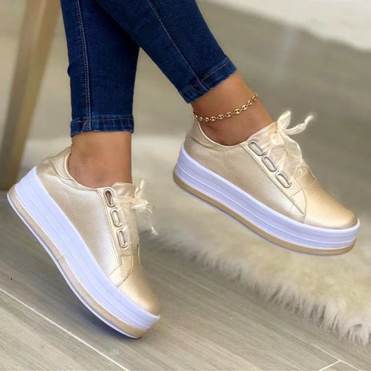 Silver lace-up platform sneakers, round toe, white bow detail, thick white sole