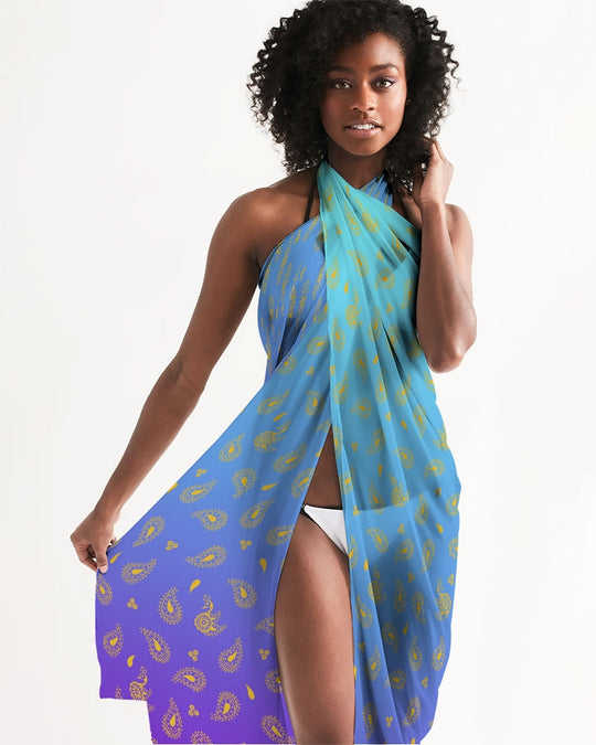 Turquoise halter swim cover-up with gold paisley pattern and side slit