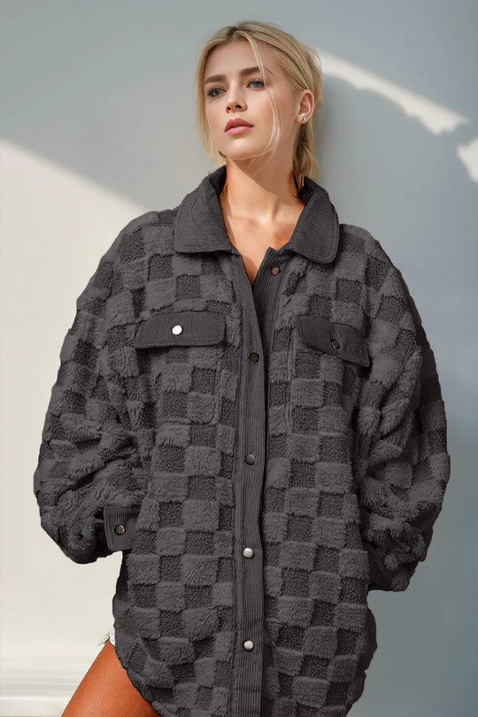 Black fuzzy checkered shacket with button-up front, point collar, flap chest pockets