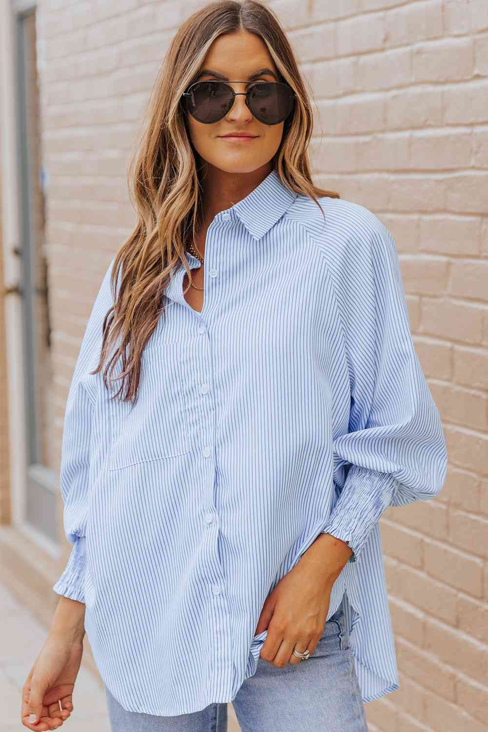 Pastel blue striped shirt front, button placket and pointed collar