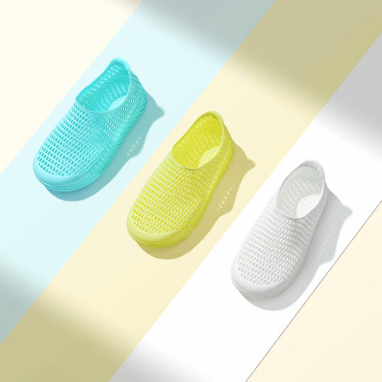 Assorted colors kids slip-on shoes with perforated mesh uppers, including aqua, yellow, white