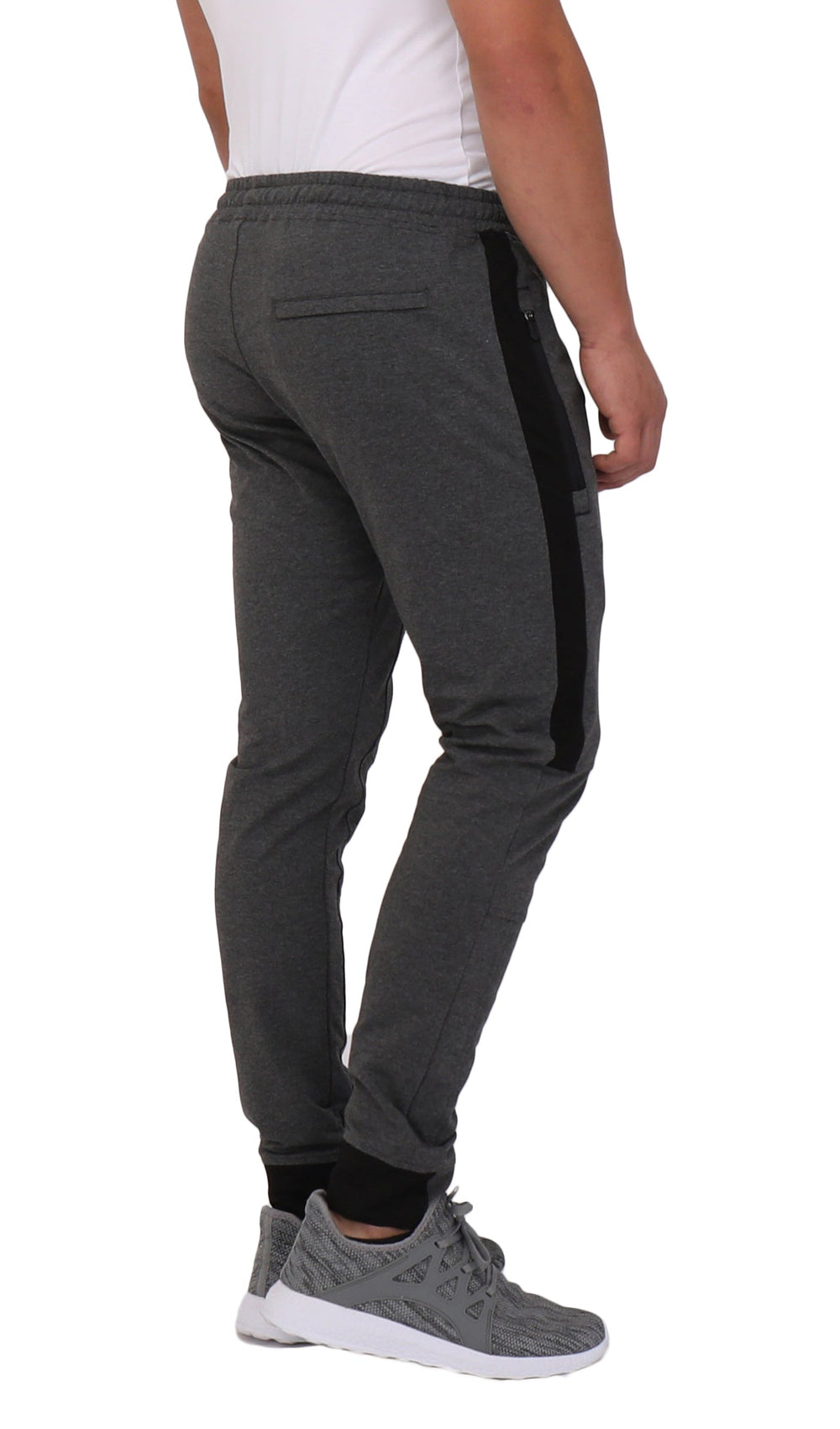 Dark grey/black Infinite Flex joggers with elastic waistband and side panel stripe