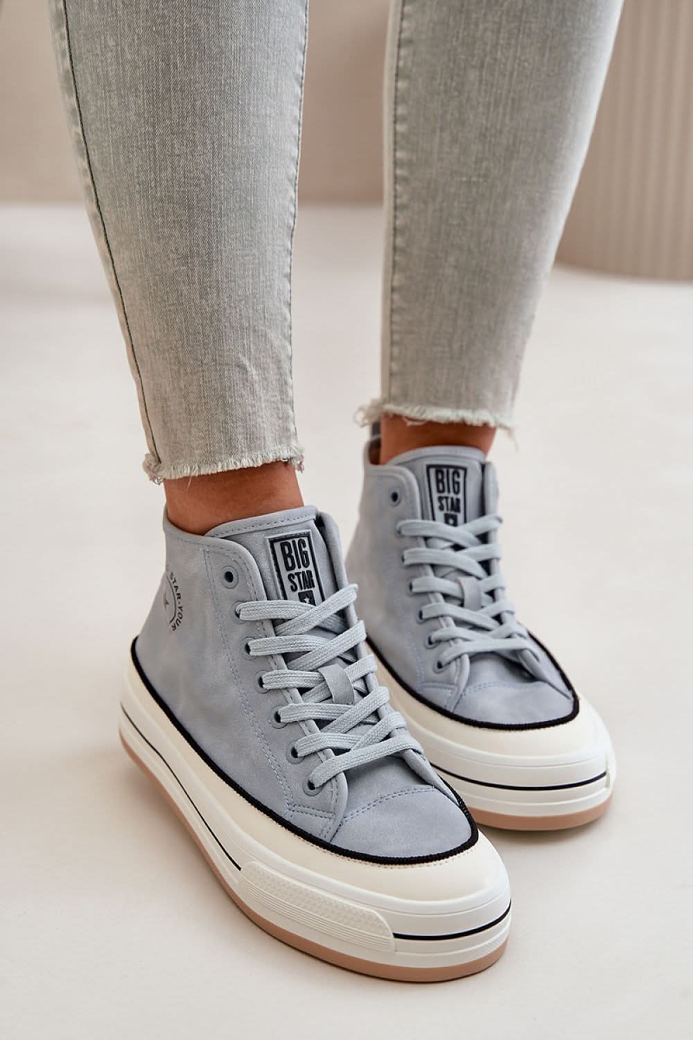 Pair of light gray suede sneakers with lace-up ties, off-white midsole