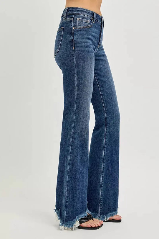RISEN dark denim mid-rise flare jeans, frayed hem detail (back view)
