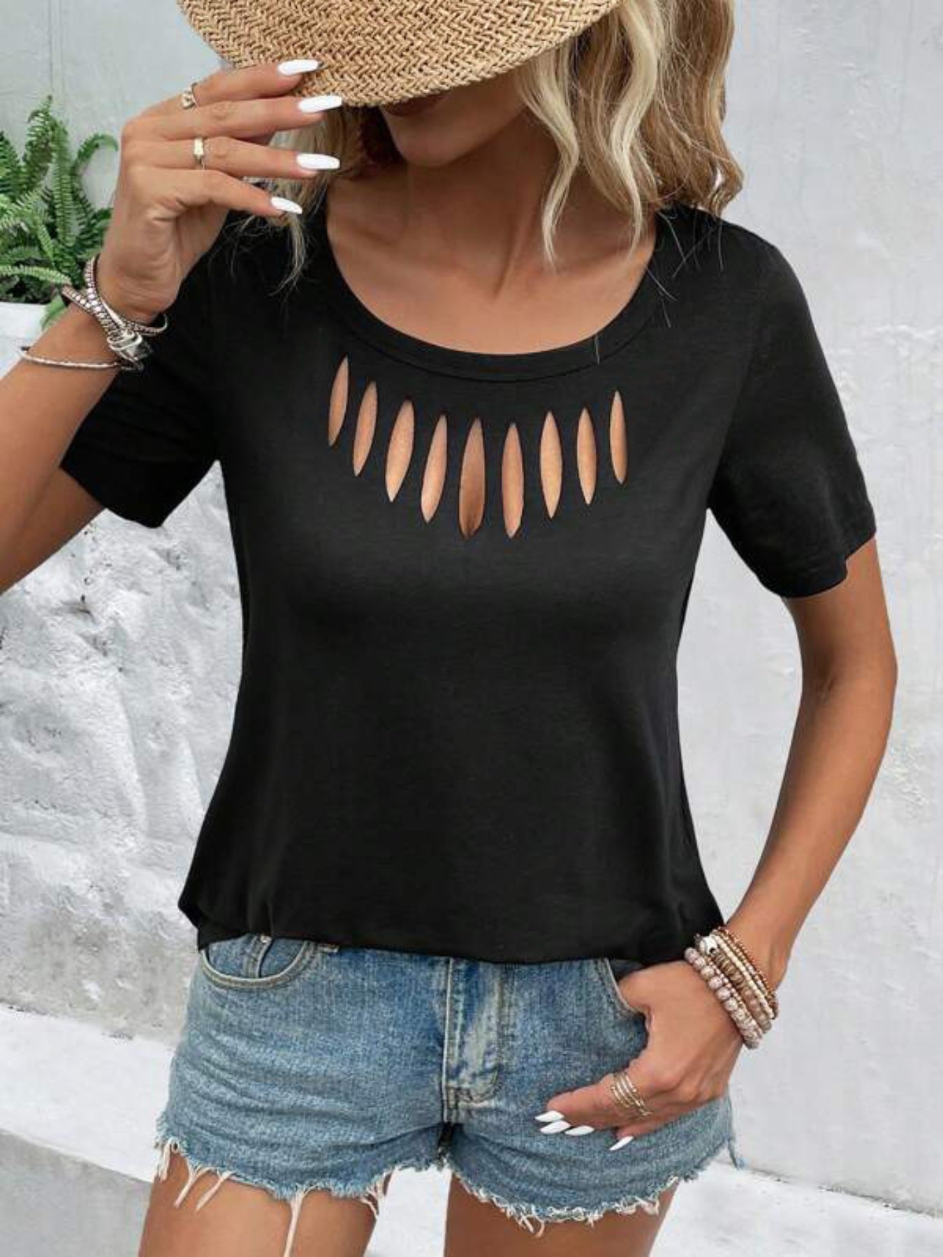 Black short-sleeve T-shirt with oval cutout neckline detail, relaxed fit