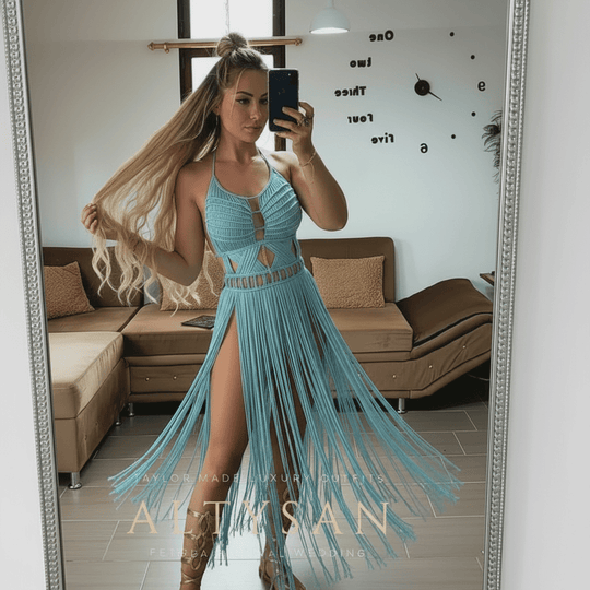 Artemis Beach Party Dress on model: blue halter maxi with cutout bodice and fringe hem
