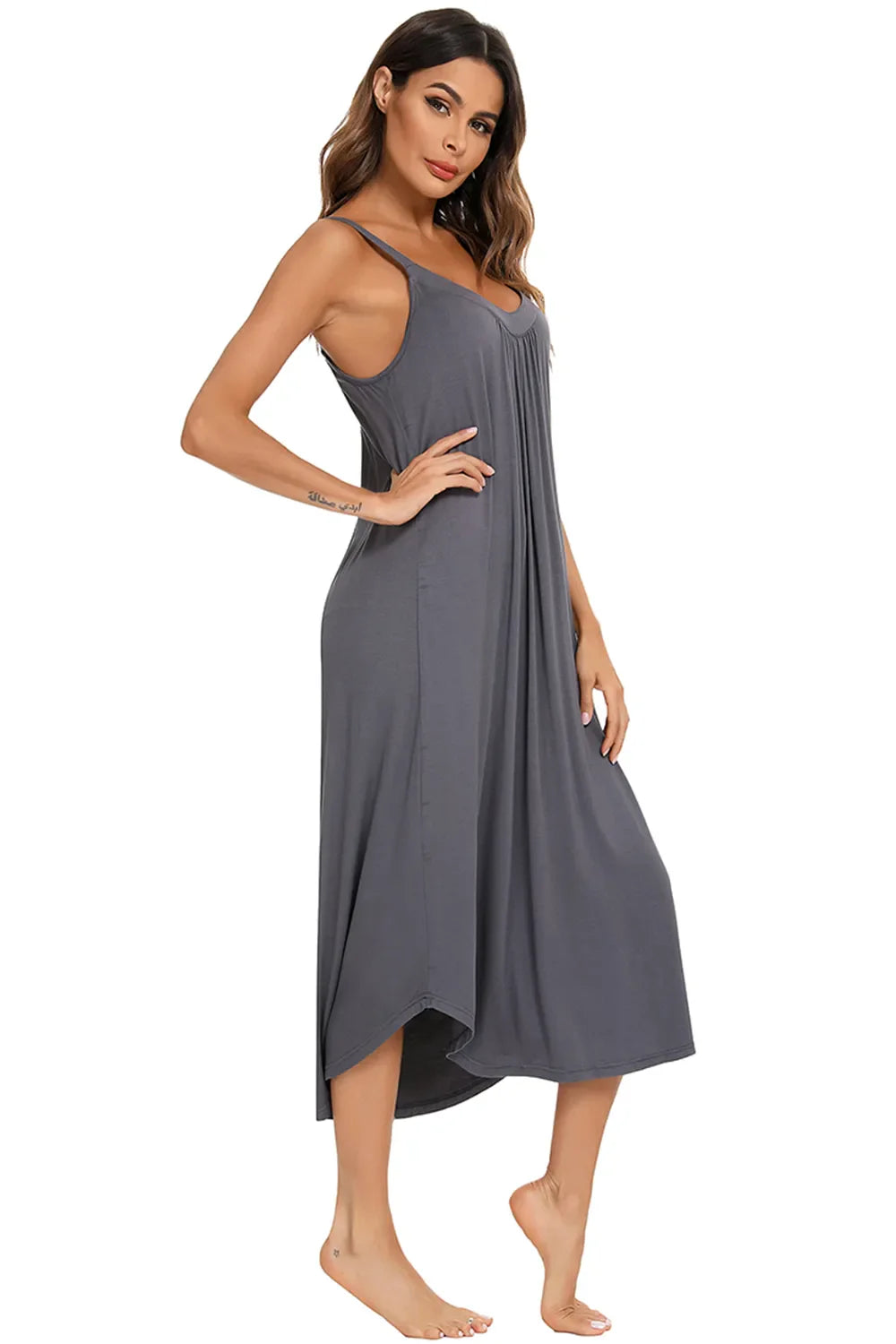 Three-quarter view of dark gray midi lounge dress with V-neck and lightweight drape