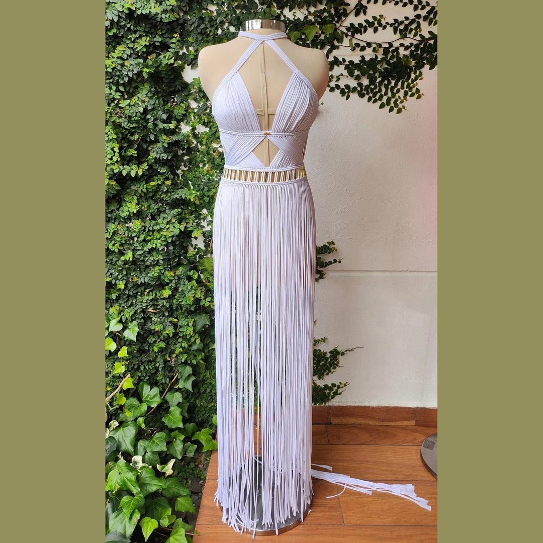 Selene ivory dress back view: crisscross halter straps over open back, long fringe maxi