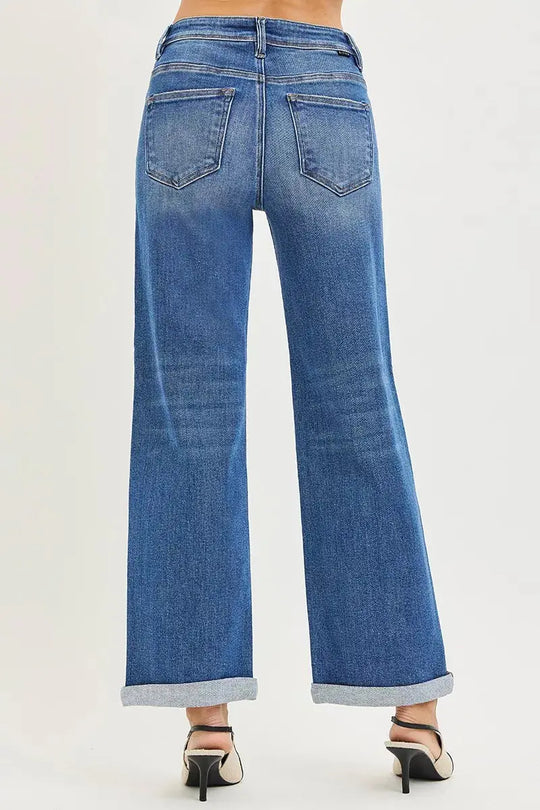 Medium wash straight-leg jeans, high rise, cuffed ankle hem and back pockets