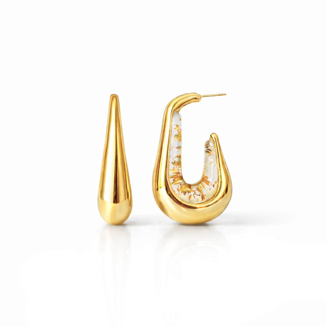 Drop hoop earrings with gold-tone hoops and clear enamel with gold flecks