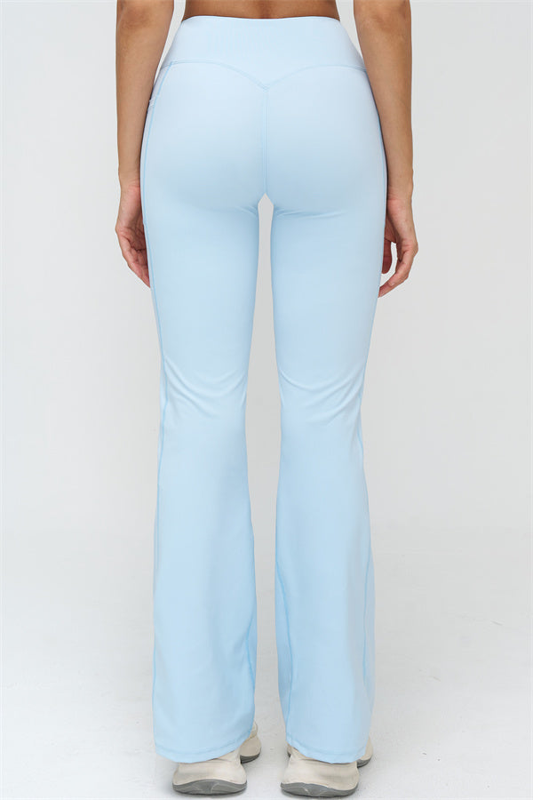 Hellblaue Schlagleggings, hinten: hohe Taille und weich fallendes ausgestelltes Bein