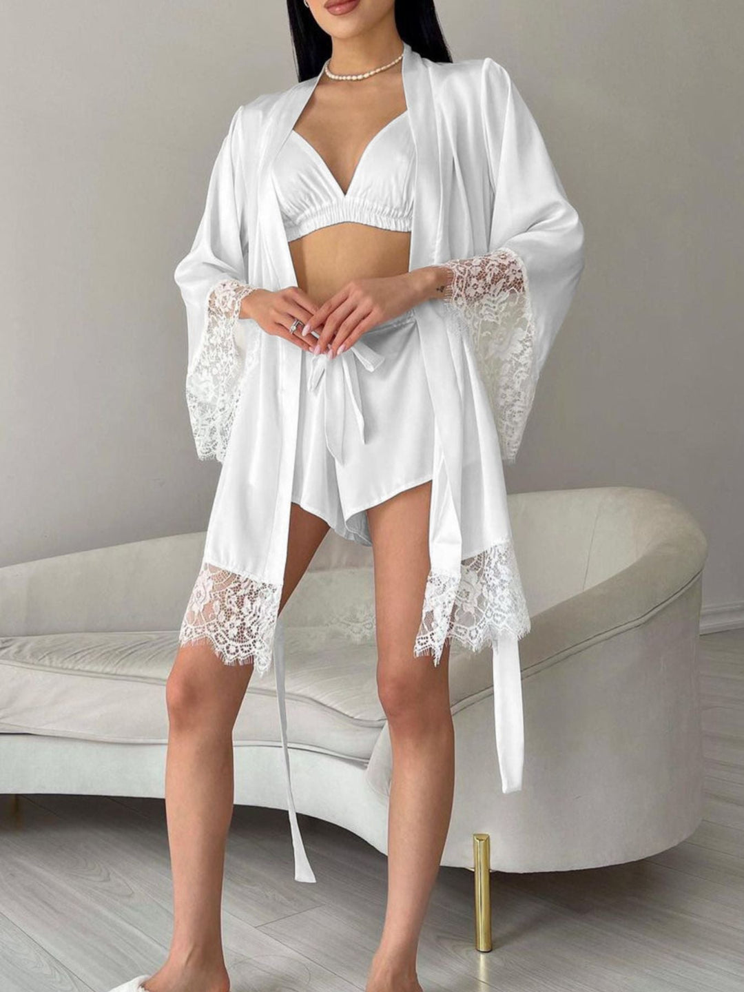 White lounge set: V-neck cami with lace-trim cardigan sleeves and matching shorts