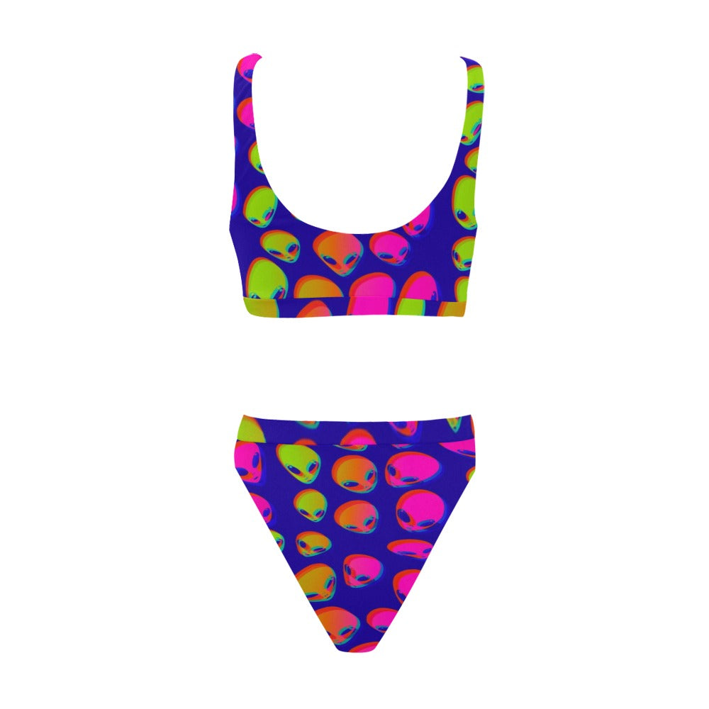 Flat lay of neon alien blast bikini set: sport top and high-waisted bottoms in blue print